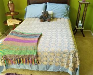 Antique double bed including linens