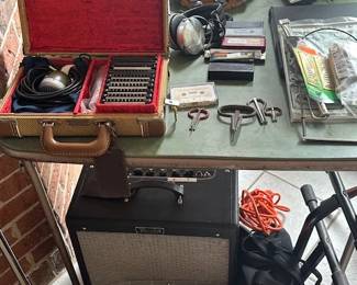 Harmonica's, fender amp and all equipment even several tuning forks.