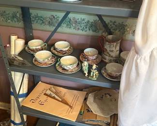 Oriental hand painted dishes, cups and other oriental items.