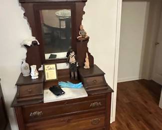 Victorian Era Chest of drawers with marble inset.