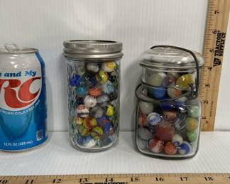 2 JARS OF MARBLES
