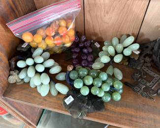 Carved stone grape bunches