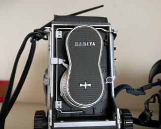 OLD MAMIYA CAMERA... WE HAVE LOTS OF LEATHER CAMERA CASES TOO, ONE MAY FIT.