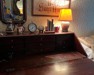 This drop down English secretary is in excellent condition as well..