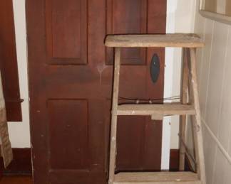 Antique wooden doors, ladder