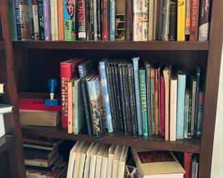 3 book cases full of books art books, kids books , novels, cooking etc.