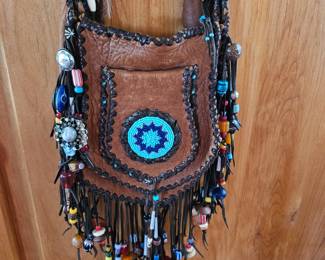 Beaded bag including tribal beads