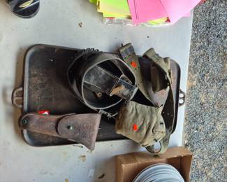 Military items and cast iron grill