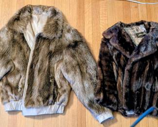 Coat on the left is a hard to find vintage reversible fur/leather jacket