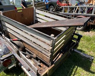 Small Mower Trailer sitting in Larger Trailer