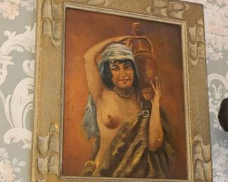 "Orientalisches Zigeunermädchen mit Krug" (Oriental Gypsy Girl with a Jug) and is signed by Schluckmüller München. 