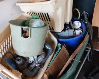 Several boxes of miscellaneous plumbing parts