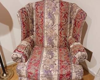 Floral upholstered chair with Reds beige gold and lavender