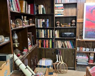 This photo shows more of the bookcases and books available in the sale.