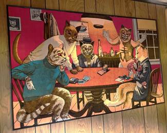 It's not entirely clear what card game the cats here are playing, but poker might be an option.