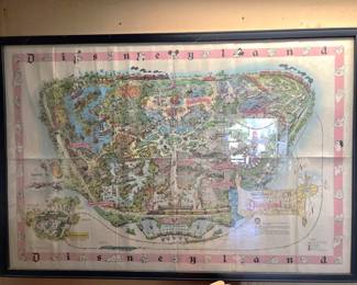 This is cool. It is a framed, 1961 Disneyland souvenir map, likely drawn by Sam McKim. If you're a Disney fan, this is a cool treasure.