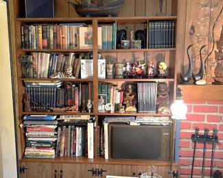 The sale has a fair quantity of books, bookend sets, and figurines. This is one example.