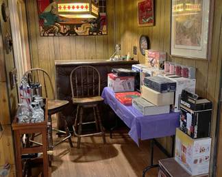 Many of the pictures show a lot of smaller treasures. This is one of those pictures, but kitchen appliances and a pair of tall chairs are prominent here.