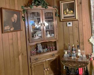 This corner cabinet could be yours, to fill that hard-to-fill space in your house.