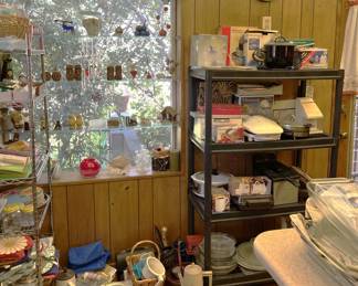 Here is a different view of the shelves with the kitchen-related items. Ask nicely and the shelves could be yours, too.