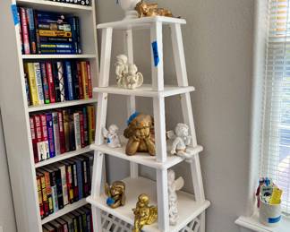 White Tier stand, Angel / cherubs, white book shelf, and more genres of books to choose from/ different authors