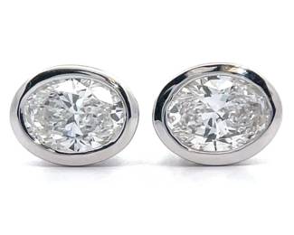 Contemporary 2 Carat Oval Diamond Solitaire Bezel Stud Earrings in 14k White Gold