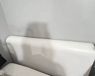 Two matching twin headbords and frames