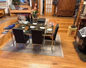 $22,000 original cost glass and chrome 6 foot to 10 foot dining room table with chair chairs
Really want to get rid of this one $2000 takes it