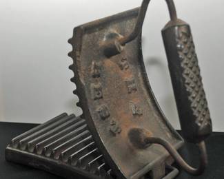 ANTIQUE CAST IRON FLUTER "THE BEST"