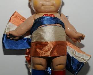 RARE MARKED VINTAGE KEWPIE DECORATED WITH RED, WHITE & BLUE RIBBONS AND RED BOOT S