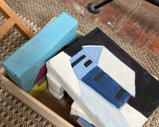 many baskets of small works on board, canvas, paper
