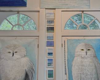 large owls, small water scenes