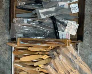 Dozens Of Propellers Made Of Both Wood And Plastic Featuring Varying Lengths And Brands