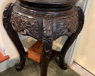 Hand carved plant stand