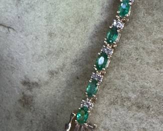 #J10 - Emeralds (6 ctw) & diam (1/2 ctw) bracelet 7 1/4 Long, 9.6 gr. $1,400. 