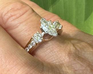 #J15 - Lady's ring, 1.04 ct marquise (clarity I, color H-I) 18kt mount with a plat 950 head (10x5.4mm), 1 ctw side rounds (1/3 ct each)(clarity I, color H-I) ring guard 14kt. 6.9gr, size 7.  -$3,250.00