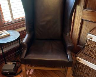 #58 - $240 - Brown  leather wing back chair 30wx30dx52t