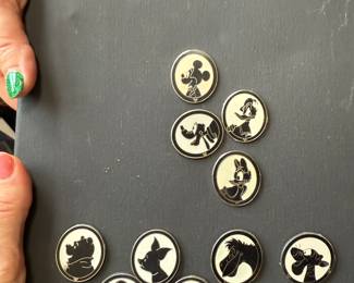 #130 - $60- Collection of 10 Disney Silhouette pins 