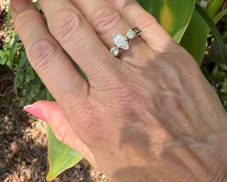 #J15 - Lady's ring, 1.04 ct marquise (clarity I, color H-I) 18kt mount with a plat 950 head (10x5.4mm), 1 ctw side rounds (1/3 ct each)(clarity I, color H-I) ring guard 14kt. 6.9gr, size 7.  -$3,250.00