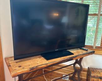 #25 - $110 - 60 inch Sharp Aquos TV
