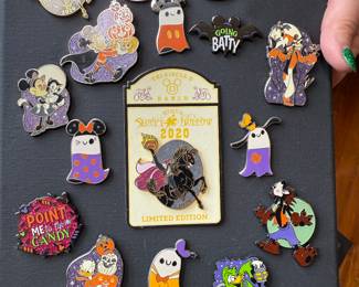#129 - $64 - Collection of 16 Disney Halloween pins 
