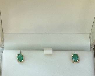 #J16 - $395 - 2 ct. emeralds oval stud earrings on 14kt gold posts. 7.5mm. 1.75gr.
