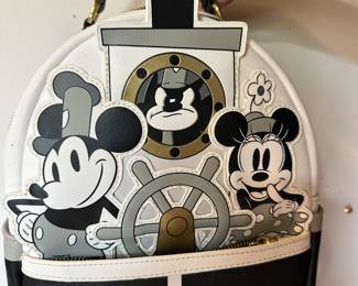 #11 - $80 - Steamboat Willie Disney park lounge fly backpack cream
