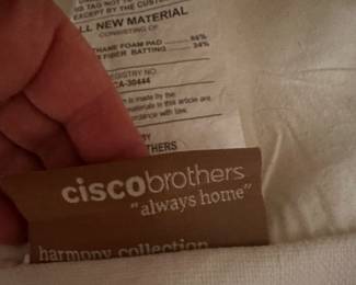 #105 - $180 - Cisco brothers down filled white linen swivel chair 32wx37dx36t 