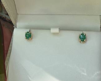 #J16 - $395 - 2 ct. emeralds oval stud earrings on 14kt gold posts. 7.5mm. 1.75gr.