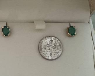#J16 - $395 - 2 ct. emeralds oval stud earrings on 14kt gold posts. 7.5mm. 1.75gr.