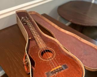 baritone ukulele in a custom case