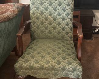 upholstered chair with wooden claw feet. $50