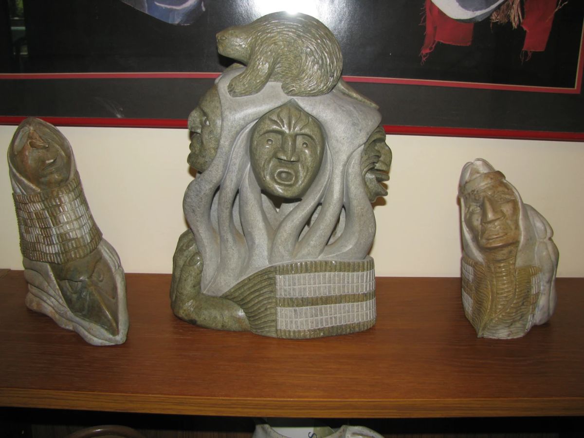 Stone carvings. Center carving by Gene Thomas called "Spirit of the Beaver"
