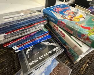 Assorted CDs and VHS Tapes